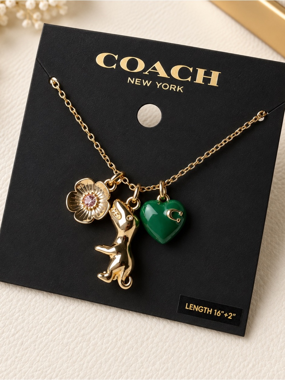 COACH Gold-Tone Charm Necklace with Green Heart and Flower